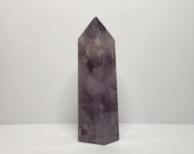 Clear Amethyst: Pure serenity. Promotes peace, wisdom and harmony. Spiritual purification for balance.