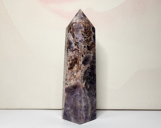 Amethyst: Calming and protective properties. Known to promote inner peace, spiritual growth and intuition.
