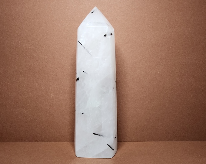 Tourmaline Quartz: Purifying, protective. Unites body and mind. Balances clarity and positive energy.