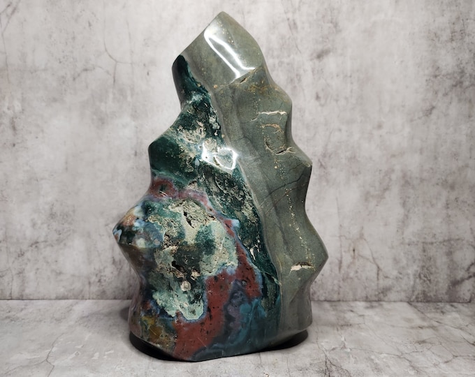 Polychrome Jasper with deep colors and flowing transitions. Promotes stability, endurance and connection with natural rhythms.