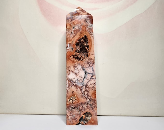 Red Flower Agaa: Vibrant red and floral patterns, promotes emotional healing, courage and personal growth.