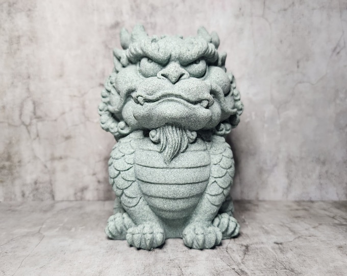 Sandstone Quilin Statue: A Fengshui item for peace and prosperity, symbolizing positive energy and protection in the home.