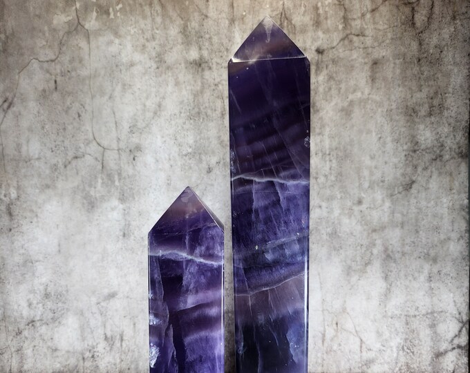 Purple Fluorite: Promotes spiritual growth, calms the mind, increases intuition. For inner peace and clarity.