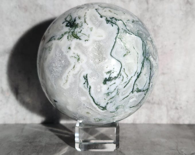 Green moss agate ball full of earthly energy. Brings inner peace, promotes growth and protects against negative influences.