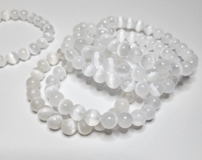Selenite: A transparent to semi-transparent crystal often used in jewelry for its soft glow and calming energy