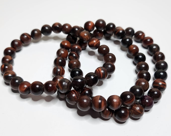 Red Tiger Eye: Red-brown stone with a characteristic shine. Protective and stimulating, it promotes motivation, strength and self-confidence.