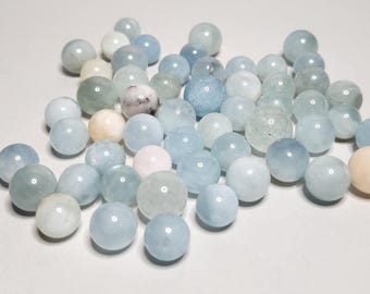 Aquamarine Multi Color pearls: Gemstone in blue, white and pink shades. Promotes tranquility, emotional balance, communication and self-expression.