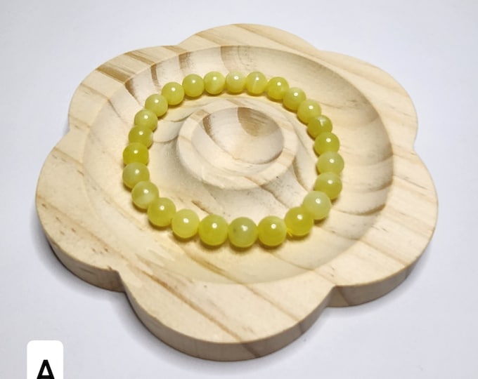 Lemon Jade: A light yellow gemstone, refreshing and uplifting energy. Promotes optimism, self-confidence and emotional balance.