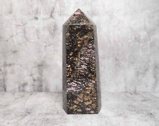 Rhodonite: Nurtures love and self-growth. Balance and self-expression. Enhances harmony in relationships with a touch of emotional stability.