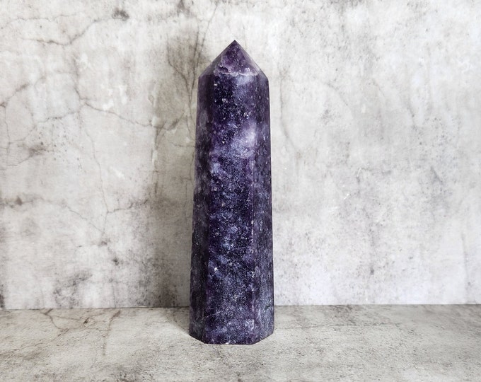 Purple Lepidolite: Calms and promotes inner peace, balance and spiritual growth with its soothing energies.