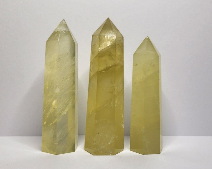 Citrine: Created from heated Amethyst, stimulates creativity, increases self-confidence. Positive force for growth and prosperity.