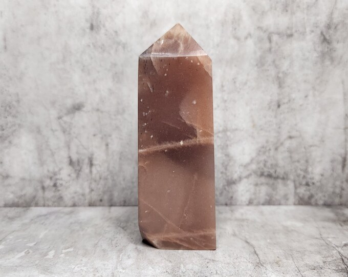 Peach Moonstone: Radiant as the sunset, it promotes love, intuition, a serene mind and heart-warming energy.