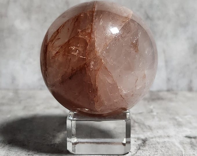 Fire Quartz Ball: Full of energy and determination, is your companion in overcoming obstacles and unleashing your inner fire.