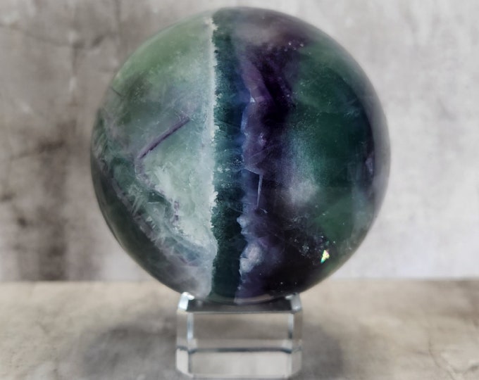 Rainbow fluorite protects against psychological overstimulation and the energy of other people. Calms the mind and gives a safe feeling.