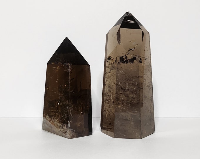 Smoky Quartz: Grounding protector, clears the mind, provides stability and emotional balance. Strength against negativity.