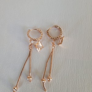 Luxury designer women earrings.  18k  Rose Gold Earrings