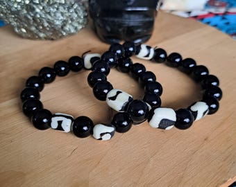 Hueso tribal negro de ónix