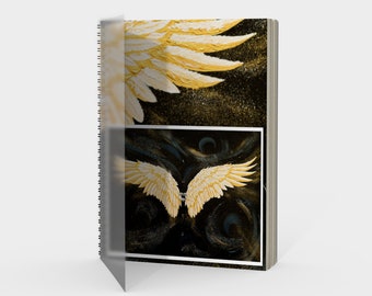 Tagebuch mit goldenen Engelsflügeln