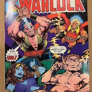 May include: A vintage comic book cover titled "Warlock" by Marvel Comics. The cover features dynamic illustrations of muscular figures in action, with speech bubbles and the text "A Trollish Tale of Triumph and Tragedy!"