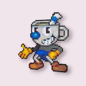 May include: A pixel art figure of a cup with a blue nose, blue shorts, and yellow gloves. The figure has a white body with black accents and brown shoes. The cup has a blue and white striped straw.
