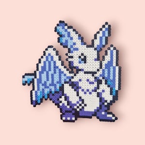 May include: A pixelated bat-like creature made from colorful beads. The wings and ears are a gradient of blue, with white and purple accents. The background is a solid light pink.