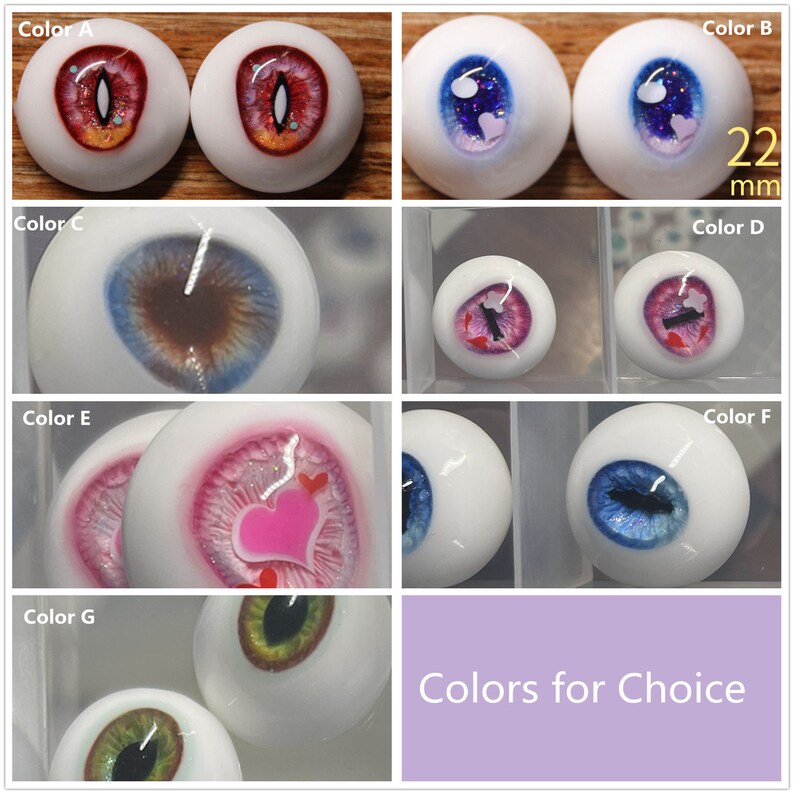 May include: A selection of 22 mm doll eyes in various colors and designs, including red, blue, green, pink, and brown. The eyes are arranged in a grid with labels for each color.