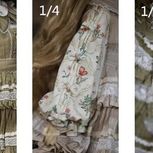 May include: Close-up of three doll sleeves with different lengths. The sleeves are made of white fabric with a floral print and have ruffles at the cuffs. The sleeves are labeled 1/3, 1/4, and 1/6.
