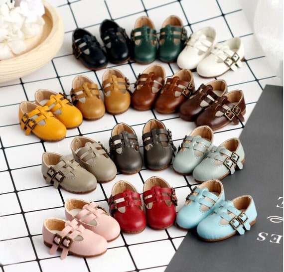 Scarpe alla best sale bambola