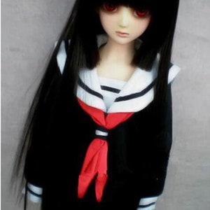 May include: A black haired doll wearing a black and white sailor uniform with a red bow tie. The doll has red eyes and a serious expression.