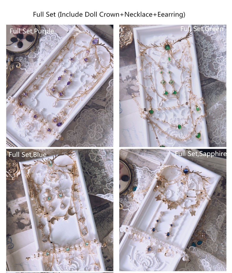 May include: Four sets of doll jewelry, each including a crown, necklace, and earrings. The sets feature gold-tone metal, clear crystals, and colored stones in purple, green, blue, and sapphire. Text labels include Full Set, Purple, Green, Blue, and Sapphire.
