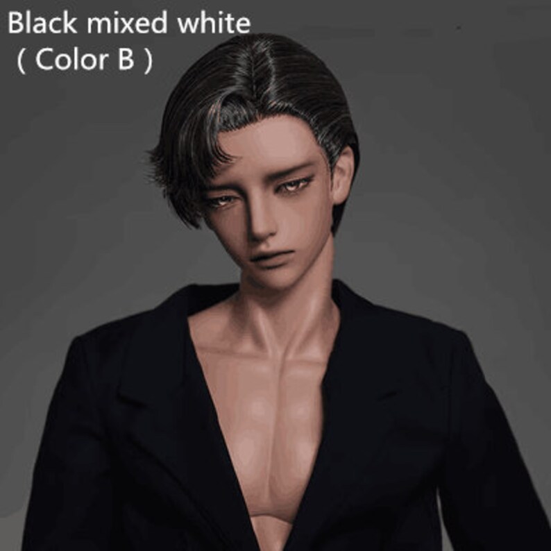 May include: A doll with black mixed white hair wearing a black blazer. The doll has a neutral expression and is looking down.