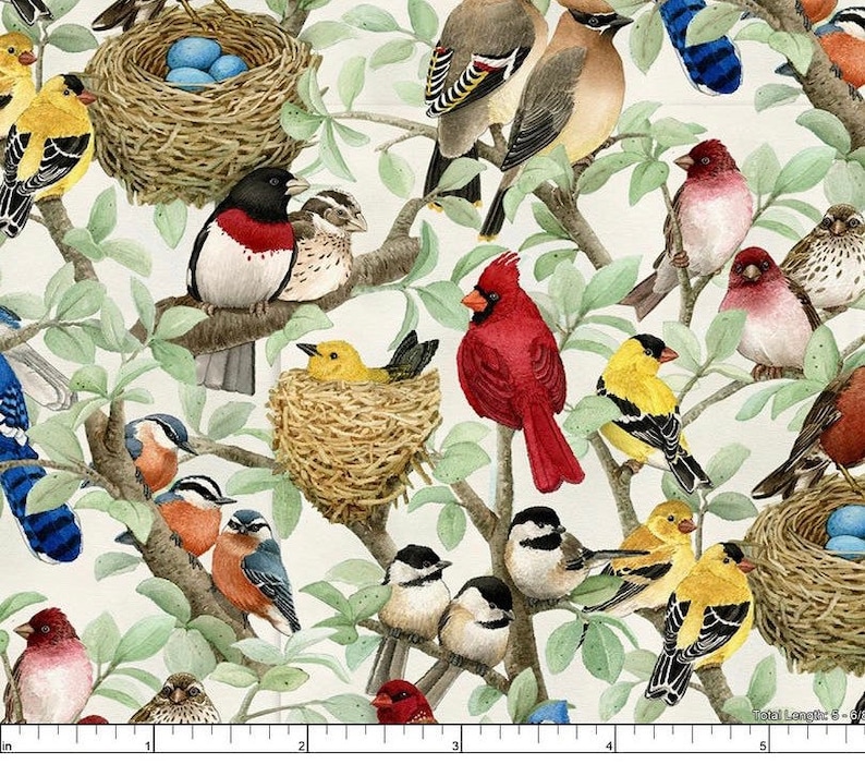May include: A colorful fabric featuring a variety of birds perched on branches and in nests. The birds are depicted in a realistic style with detailed feathers and beaks. The fabric has a white background with green leaves and branches.