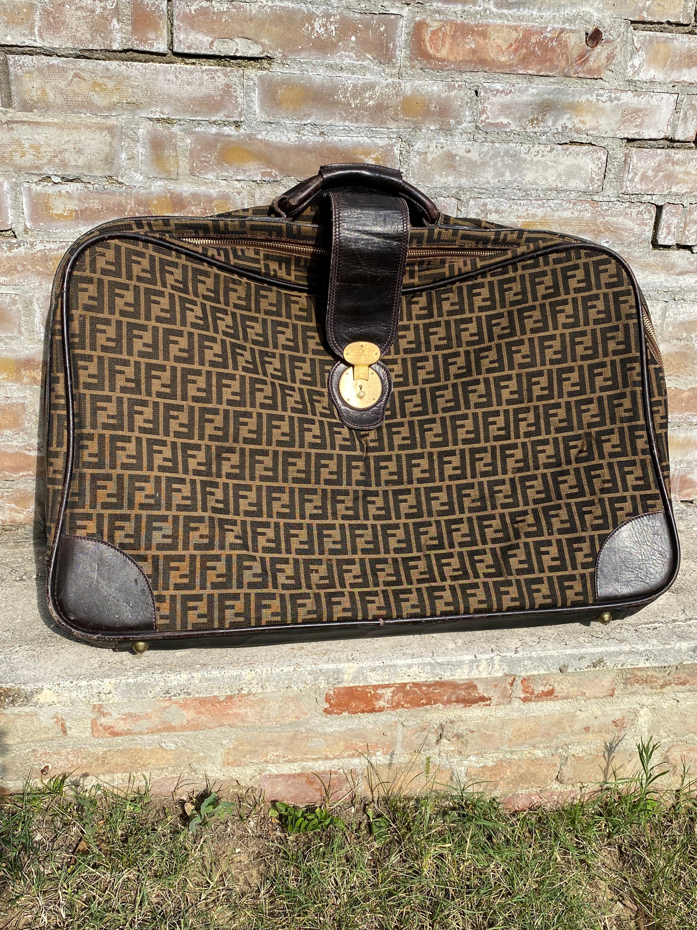 Fendi travel hotsell luggage