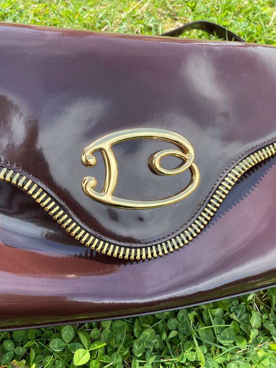 Pochette braccialini best sale