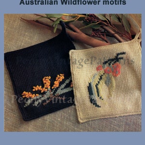 May include: Two knitted pot holders with Australian Wildflower motifs. One is black with a yellow flower design, the other is beige with a red flower design.  PeonyVintagePatterns.