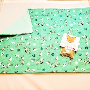 Teal Cat Faces Flannel Catnip Toy Mat: Refillable & Washable