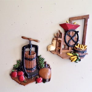 Vintage Corn Shucker and Apple Press Homco Wall Plaques, Pot Metal Set of 2