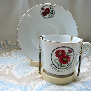 Bone China September Birthday Porcelain Cup and Saucer with Aster Flower by Papel of California, With Display Rack Holder