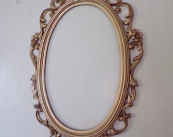 Vintage Ornate Oval Wall Mirror 26" x 16" x 2" Fleur- de- lis Design, Goldtone 1969, Syroco # 2314