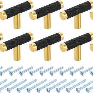 May include: A set of ten black and gold cabinet knobs with matching screws. The knobs have a textured black handle and a gold base and end caps. The screws are silver. Ideal for kitchen or bathroom cabinets.