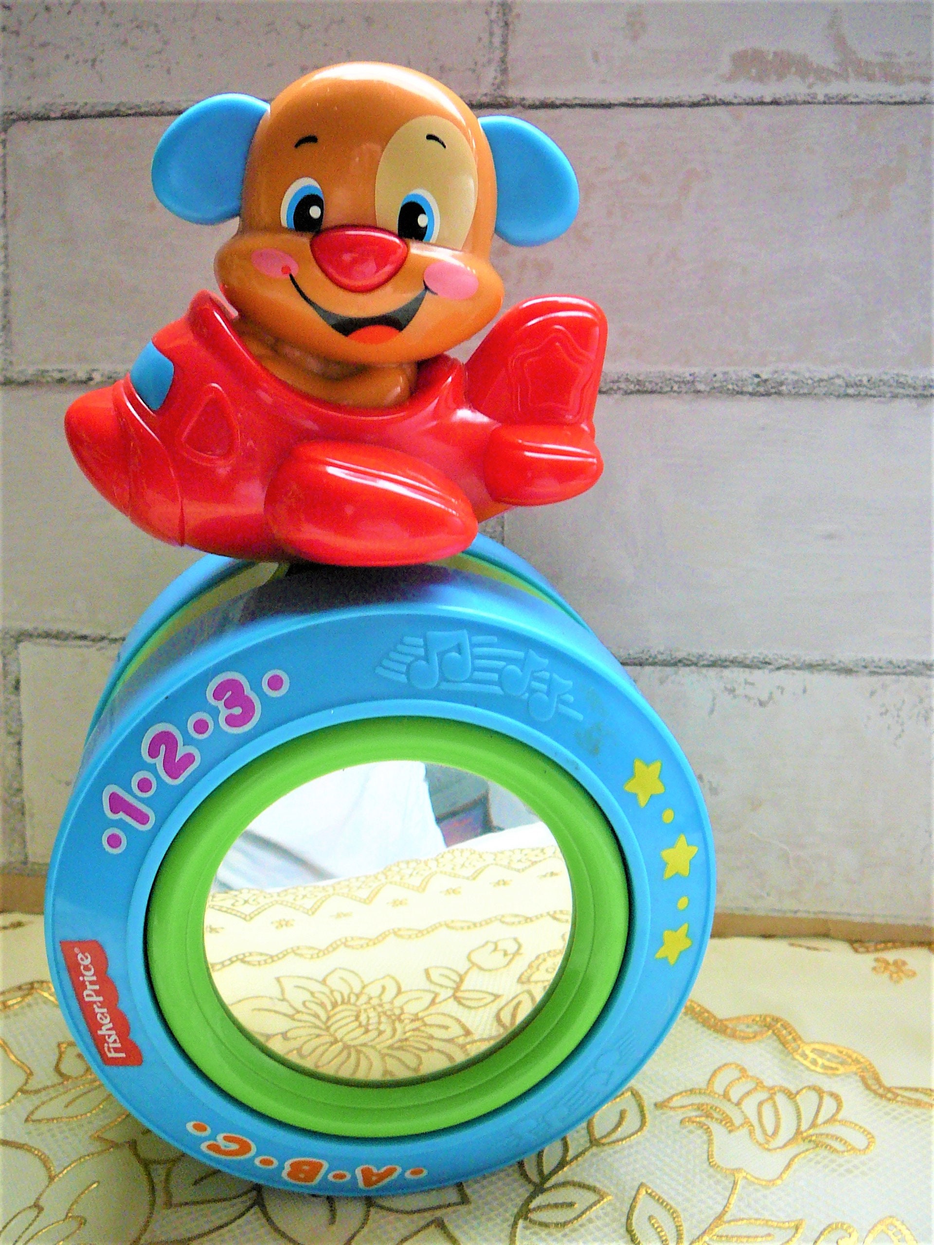 Fisher price cheap crawling toy