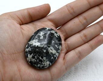 Black gem on sale with white spots