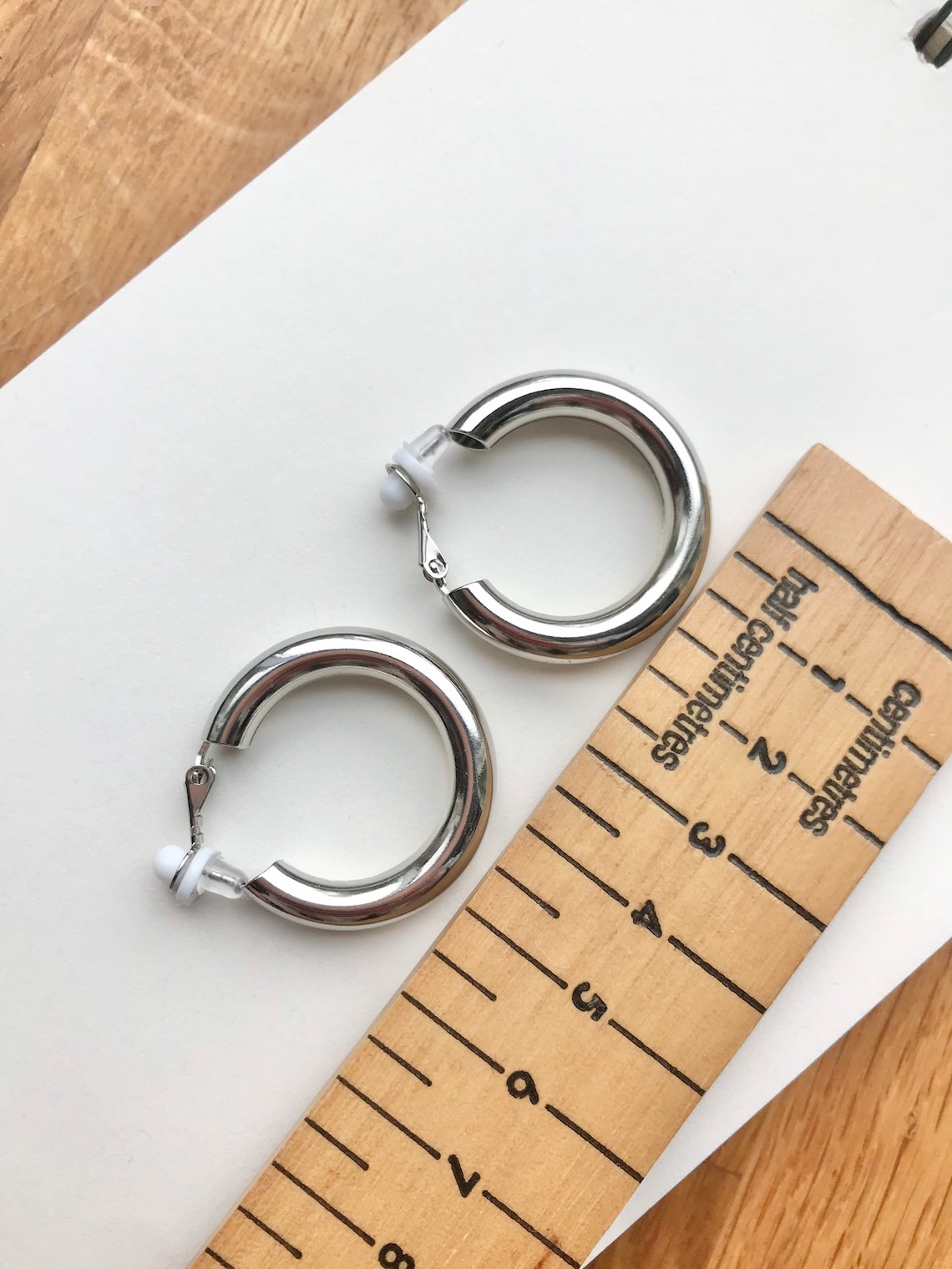 Clip on hoop earrings. Silver colour. Etsy