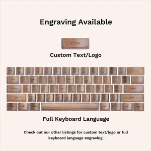 May include: A wooden keyboard with engraved keycaps. The image shows a full keyboard layout with the text "Engraving Available" and "Custom Text/Logo". The keycaps are light brown with engraved letters. The text "Liam" is engraved on a keycap. The text "Full Keyboard Language" is also visible.