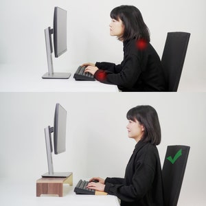 May include: Two images showing a person sitting at a desk using a computer. The first image shows the person sitting with poor posture, with their shoulders hunched and their back rounded. The second image shows the person sitting with good posture, with their shoulders back and their spine straight. The text "Check" is visible in the second image.