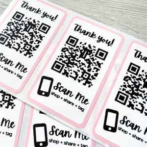 May include: Pink and white thank you stickers with a black and white QR code and the text "Scan Me shop + share + tag".