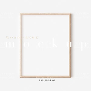 Könnte beinhalten: Ein heller Holzrahmen mit weißem Hintergrund. Der Rahmen ist quadratisch und hat ein schlichtes Design. Der Text "WOOD FRAME" ist unter dem Rahmen gedruckt.