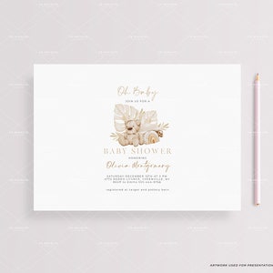 May include: A baby shower invitation with a watercolor illustration of a bear wearing a crown and sitting on a rainbow. The text reads "Oh Baby" and "Baby Shower Honoring Olivia Montgomery".