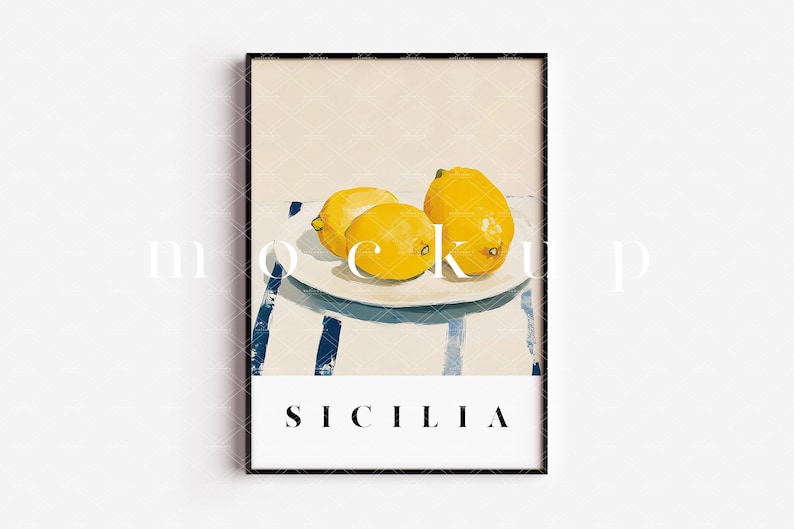 May include: A framed print with a painting of three lemons on a white plate with blue and white stripes in the background. The text "SICILIA" is printed below the plate.
