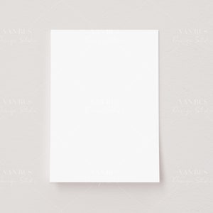 May include: A blank white card on a light gray background.